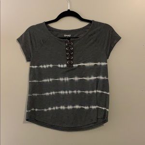 grey criss cross white striped shirt